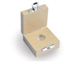 Photo d'un étui en bois pour poids milligrammes