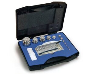 Photo d'une valise de poids en inox classe F2 forme bouton