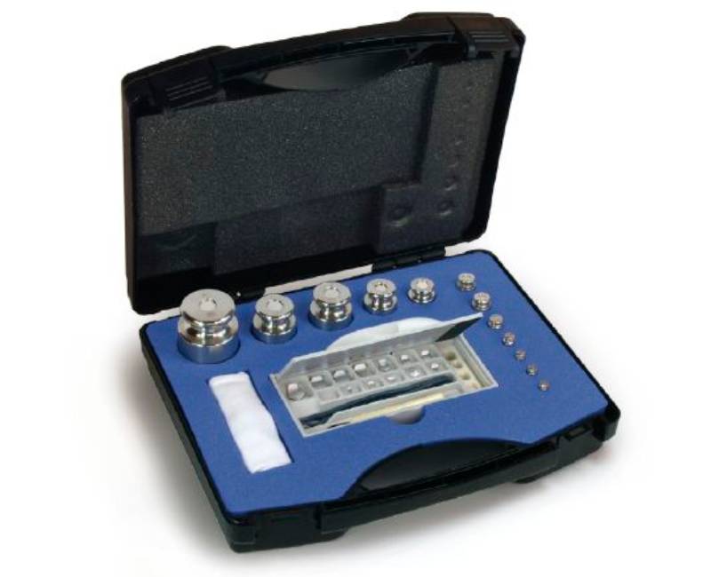 Photo d'une valise de poids en inox classe F2 forme bouton